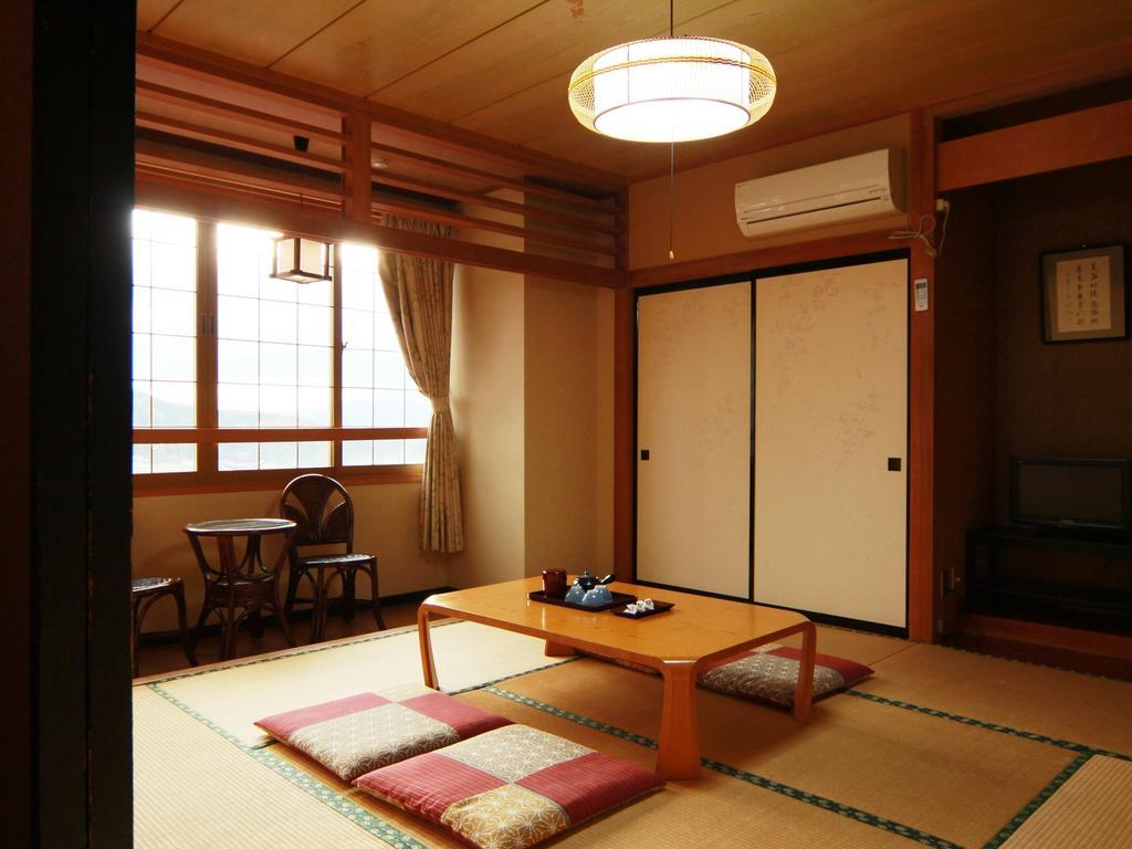 Hôtel Honkan Gentaroya à Nozawaonsen Chambre photo