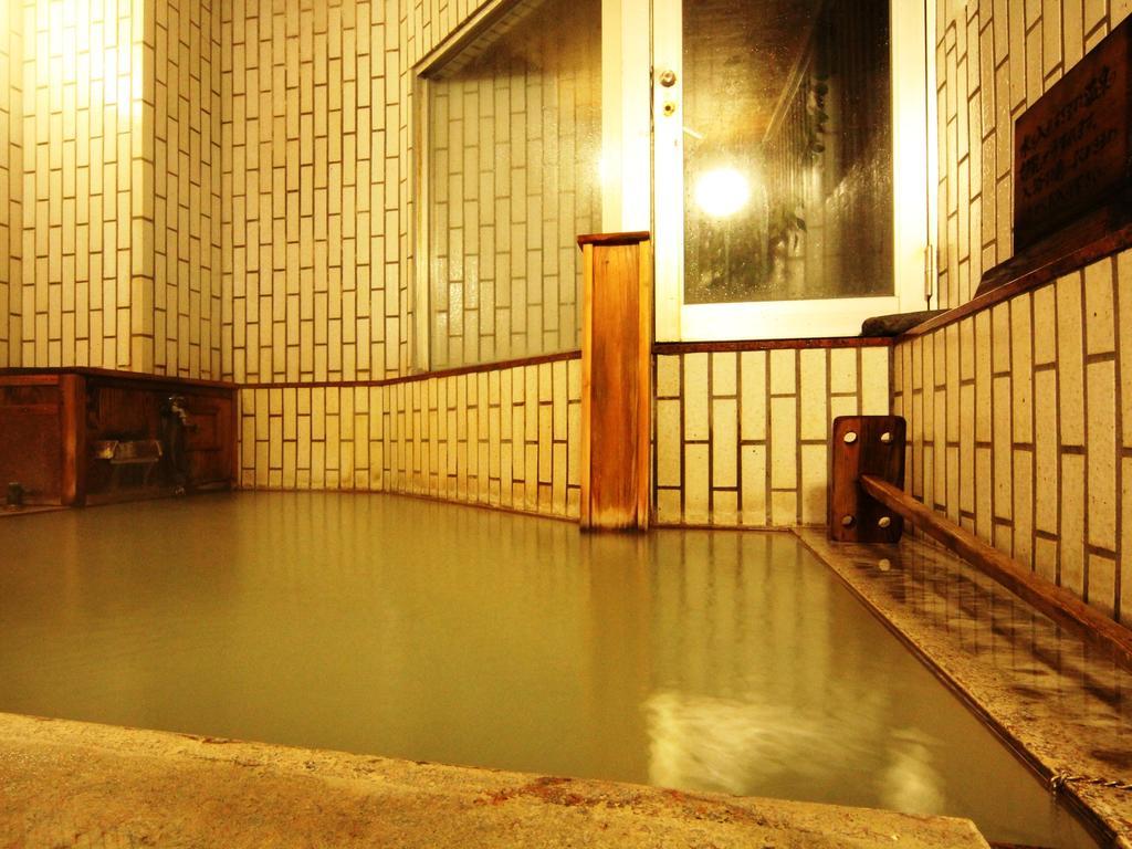 Hôtel Honkan Gentaroya à Nozawaonsen Extérieur photo