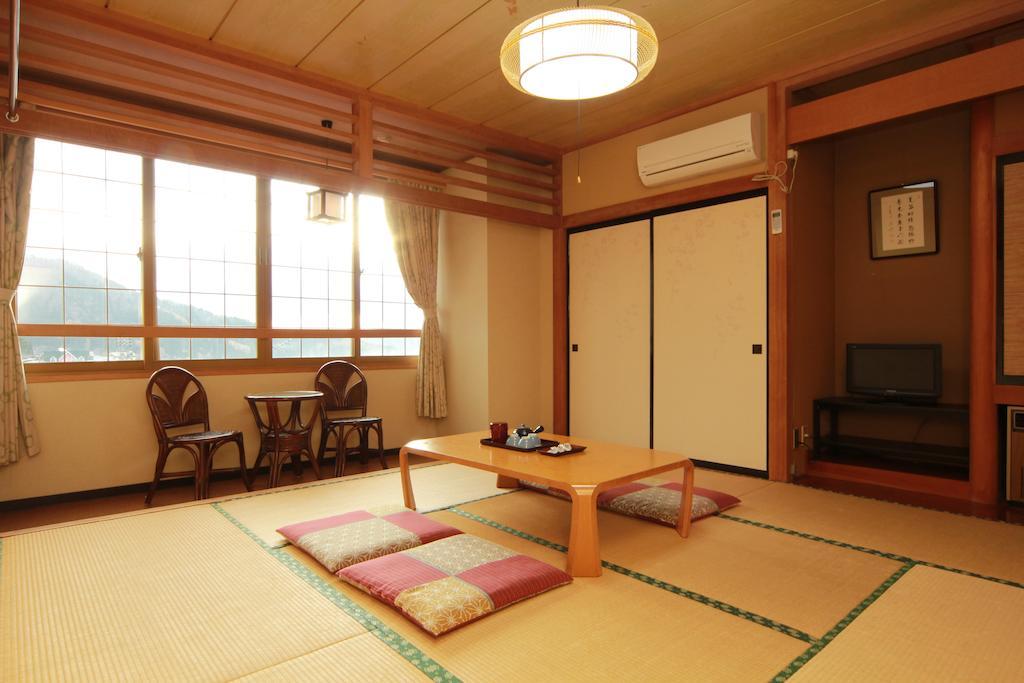 Hôtel Honkan Gentaroya à Nozawaonsen Chambre photo